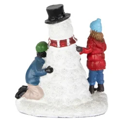 Children Build A Snowman Christmas Village Display