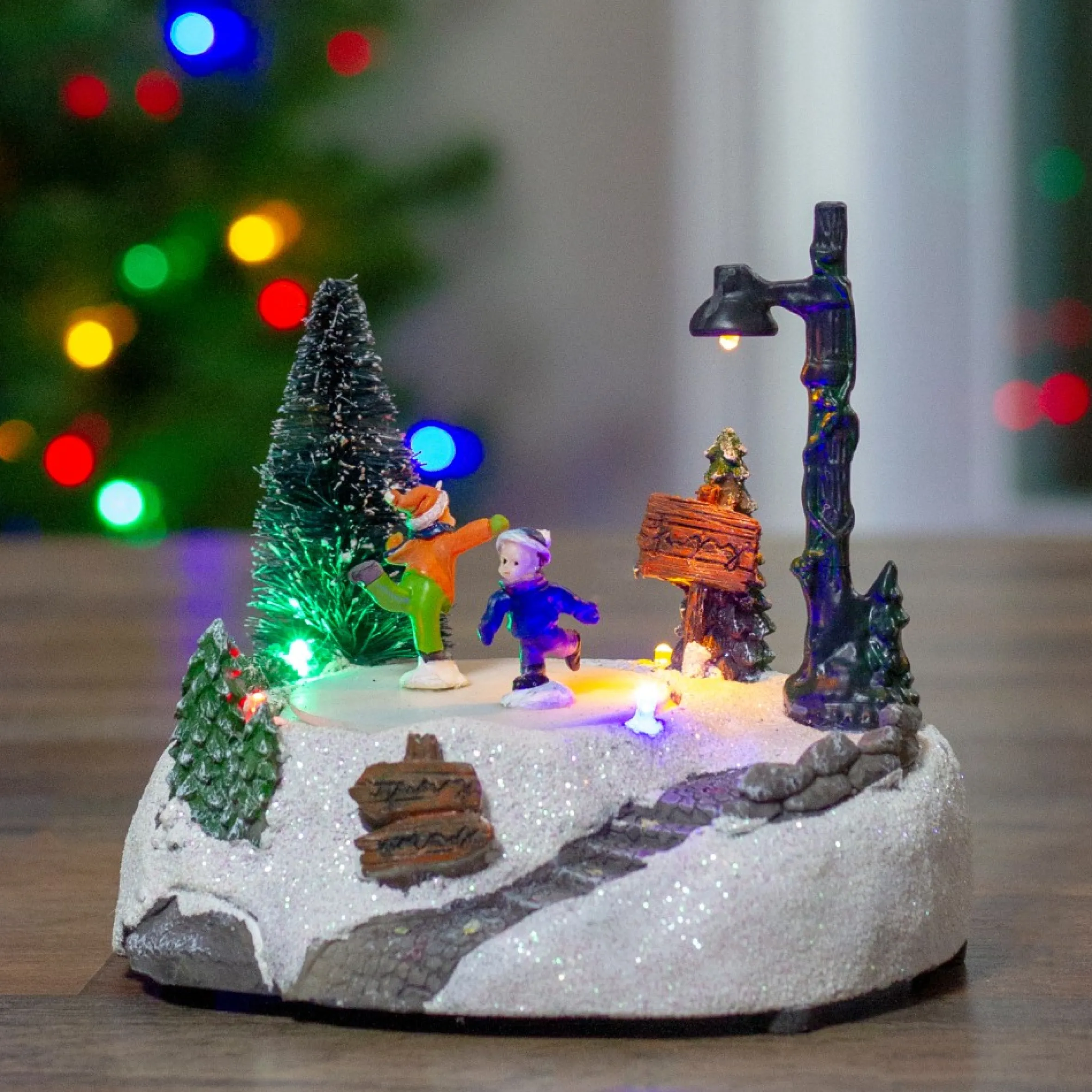 5.5" Led Lighted Animated And Musical Christmas Skating Village Display Piece