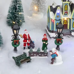 7-Piece Christmas Village Figurine And Tree Display Set